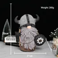 Handcrafted Viking gnome plush ornament holding an axe and shield, size 26cm by 21cm - Brown