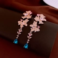 Detail of tassel earrings with pink rhinestones and blue teardrop crystal charms - 12# Butterfly Pink Blue Tassel (Silver Earring Post)