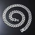 Polished silver Cuban link chain necklace with high-gloss finish on a black background - 18 inch / Silver