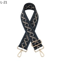Close-up of jacquard ethnic strap with geometric patterns and golden metal hooks - Blue