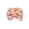 Macro detail of pink cashew floral print headband with cross-knot fabric texture - Up House Balloon