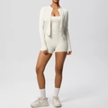 Three-piece nude feel yoga set with sports bra, high-waist shorts, and zip-up jacket - Light Ivory
