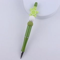 Detail of green DIY beaded pen featuring a cute turtle charm with sparkling rhinestones - Turtle Green
