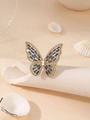 Elegant gold butterfly ring featuring blue rectangular stones and clear sparkling crystals - Blue + 14K Gold