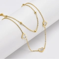 Détail de la chevillère en acier 18K avec cœurs en nacre blanche et perles métalliques - Collier Coeur 029 Uniquement