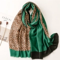 Elegant green satin and leopard print scarf with fringed edges and soft cotton-linen feel - Green