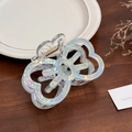 Iridescent butterfly hair claw clip with hollow wings and gold metal spring detail - Metallic Green