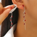 Silver long tassel earrings with red marquise zircon shown on a female model - Silver with Red Zircon Style (6086)