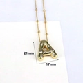 Macro detail of 18k gold plated bubble letter A pendant with zircon inlay dimensions 21x17mm - Letter A