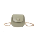 Chic bean green mini saddle bag with gold metal chain and refined stitching on white background - Green