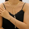 Chunky gold punk layered Y-necklace and matching bracelet set on model wearing black lace - KC Gold Y-Shape Bracelet And Necklace (5971/5068)