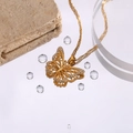 Elegant gold butterfly pendant necklace with white zircons on a wavy water chain - Butterfly