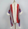 Ethnic knit cloak with faux fur collar and pom-poms in vibrant purple wave patterns - Red