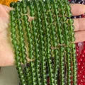 Translucent green round glass beads in multiple strands for DIY jewelry making projects - Green Glass Beads