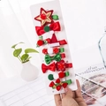 10-piece Christmas hair clips set with festive bows and stars on a display card - 10-Piece Red Yellow Star Set