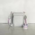 Light gray multi-zipper crossbody bag with colorful jacquard strap and rose gold hardware - Gray