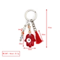 Dettaglio del portachiavi Mano di Fatima rosso con nappa e perline di cristallo - Mano di Fatima Rossa con Nappa