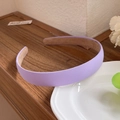 Elegant purple fabric headband in French retro style displayed on a wooden tray - Purple
