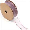 Detailed texture of purple organza ribbon rolls for elegant flower gift packaging - Violet