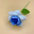 Handmade crochet rose flower in blue and white yarn with green leaves for home decor - Pointed Gradient Blue