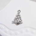 Macro shot of a silver metal Christmas tree pendant with pearls and rhinestones decoration - VD1643 White Gold Pearl Christmas Tree
