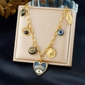 Gothic heart eye pendant necklace with black gold engraved palm charms on beige box - N3982 Necklace