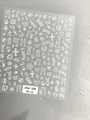 White hand-drawn nail stickers featuring cute bear, rabbit, and star doodle patterns - Aha-8802 White Icons