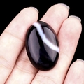 Oval black banded agate gemstone with natural white stripes for jewelry inlay - Black Agate