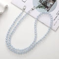 Detail of light blue transparent acrylic bead phone chain with silver metal spring clasps - Pumpkin Bead Crossbody Chain / Blue