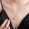French style gold plated titanium steel sunburst oval shell necklace worn by model - P1533-Gold White Shell Pendant Necklace