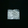 Silver metal jump rings for jewelry making in transparent packaging on black background - Silver Open Jump Rings 0.7*5 (50pcs/pack)