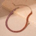 Detail of gradient rhinestone choker featuring purple to amber stones and lobster clasp - Orange & Pink Gradient Rhinestone