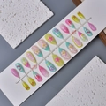 Macro detail of 3D floral and heart embossed press-on nails in macaron gradient colors - Wy-025 / 10 Pieces In Xs Size