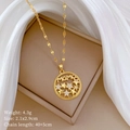 Detail of gold MAMA necklace with star charms on white silk, includes size and weight data - Gold MAMA Star Style (B311)