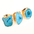 Three blue druzy agate geode rings with hammered gold-plated adjustable bands on white background - Blue