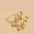 Detail of 14K gold plated earrings featuring unique zipper pull charms and cubic zirconia - White Zirconia (Gold)