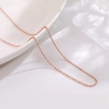 Elegant 18K rose gold plated stainless steel cable chain on a minimalist white plate - O Chain / Rose Gold