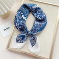 Blue and white paisley floral silk scarf with elegant polished finish on display tray - Blue Candle Flower