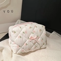 Quilted floral makeup bag in white with pink flowers and a matching bow tie detail - White Pink Floral