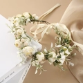 Detail of bohemian bridal flower crown with white roses and green leaves on beige ribbon - White