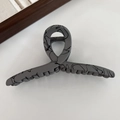 Matte grey hair claw clip with black marble patterns for high ponytail styles - Cross Grey