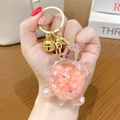 Llavero de tortuga luminosa con purpurina líquida rosa y cascabel dorado creativo - Rosa