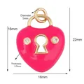 Pink heart-shaped pendant with golden keyhole design and sparkling zircon stones - Heart Lock-Rose