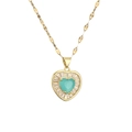 Gold heart necklace with a teal center gem and radiant crystals on a white background - Green