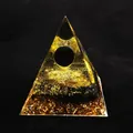 Orgonite energy pyramid with obsidian sphere and golden metal flakes on black background - QK21 Obsidian Ball / 6cm