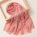 Detail view of pink cotton linen scarf with fringe edges in a wooden frame display - 180*100cm / Pink (TH39-12)
