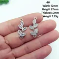 Macro detail of 12x27mm silver alloy leaf charms with texture and precise dimensions - 4# Textured Leaf