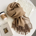 Minimalist camel faux rabbit fur scarf with tassels shown in a cozy aesthetic setting - Camel Beige