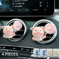 Pink cartoon pig car vent aromatherapy clip with rotating fan and fragrance refills - Two Pigs (Includes 4 Fragrance Pads)