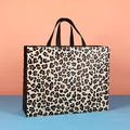 Large leopard print non-woven shopping bag with black handles and snap button closure - Leopard Print